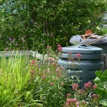 Compost bins in garden.