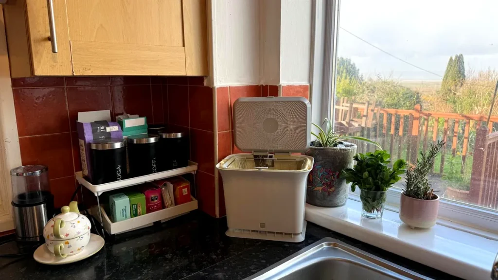 Full Circle Compost Bin with open lid.