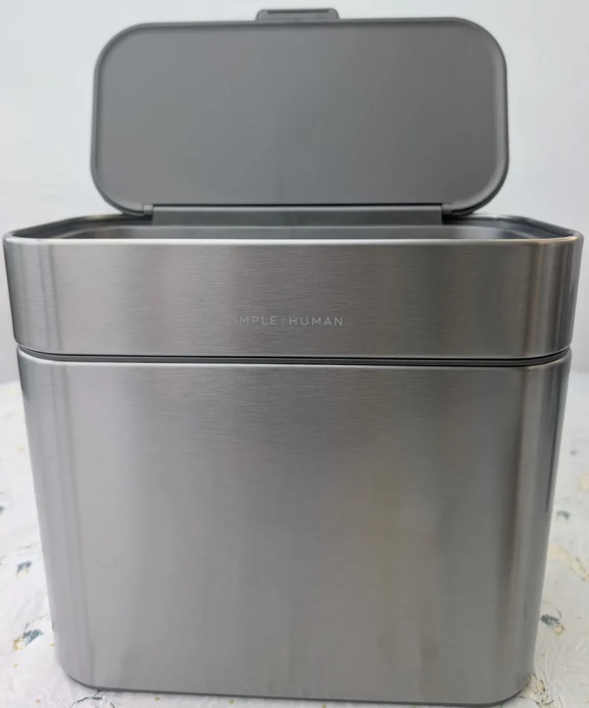 Simple Human bin with open lid.