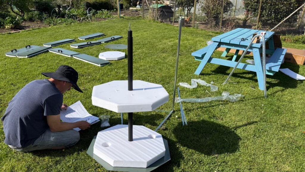 Me, sitting in the garden with the instructions.